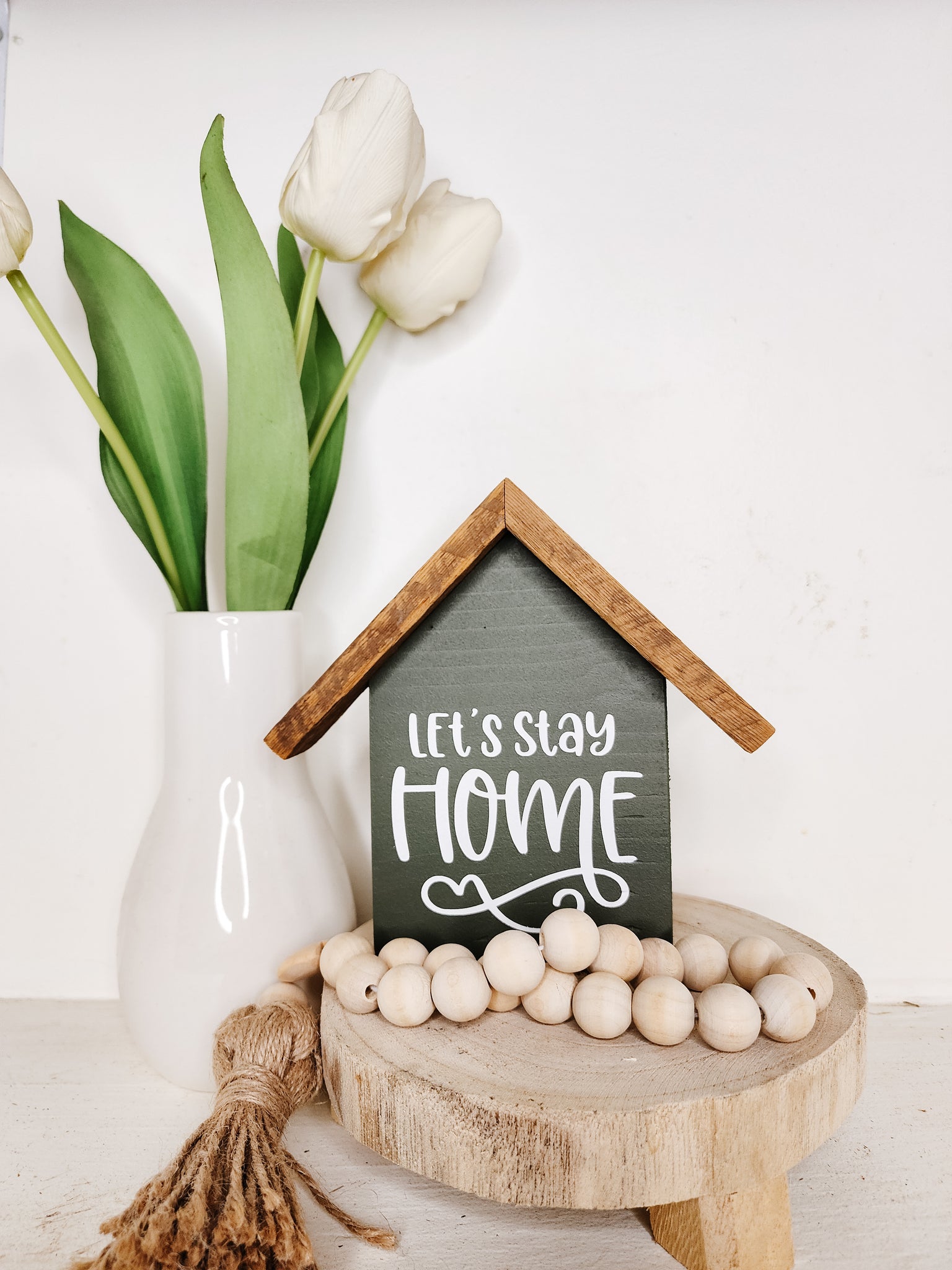 Small rustic house "let's stay home" sign- green