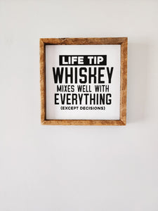 9x9 Life tip whiskey mixes well with everything sign