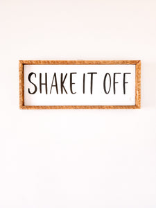 7x17 - Shake it off sign.