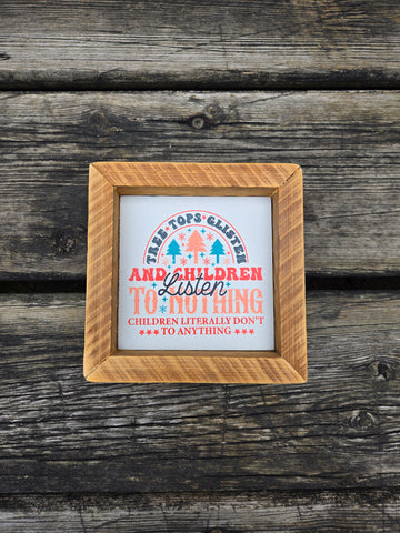 4x4 Sublimated Tree tops glisten amd children listen to nothing sign.