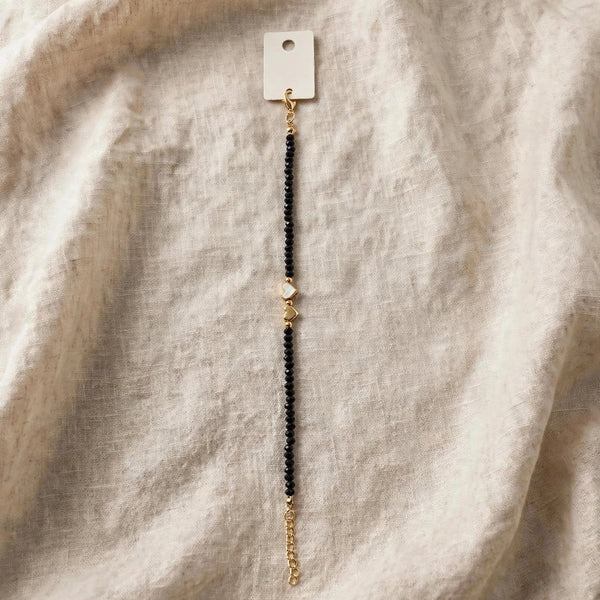 6a32f7be6982234f0f465536_black-beaded-bracelet-linen-centered-1080_1791148984770.jpg