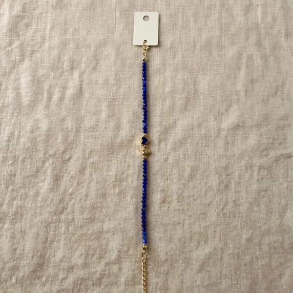 6a32f7be6982234f0f465536_blue-beaded-bracelet-centered-1080_1791148338963.jpg