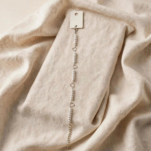 6a32f7be6982234f0f465536_silver-heart-pearl-bracelet-1080_1791134547713.jpg