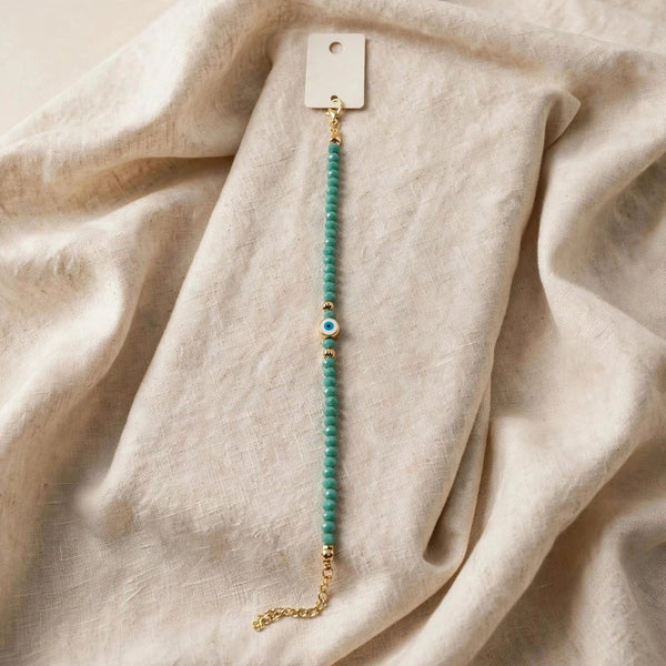 6a32f7be6982234f0f465536_teal-evil-eye-bracelet-1080_1791150123299.jpg