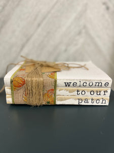 Welcome To Our Patch Book Stack