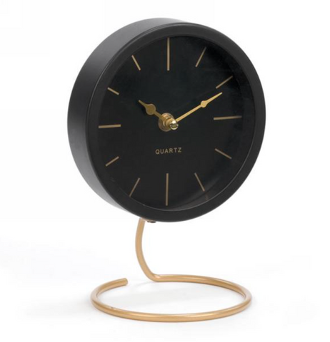 Black Clock on Gold Stand