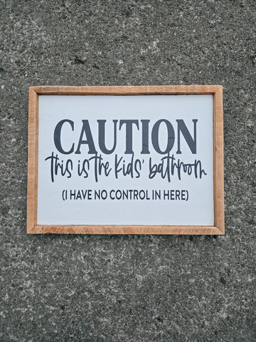13x17 Caution this is a kids bathroom sign