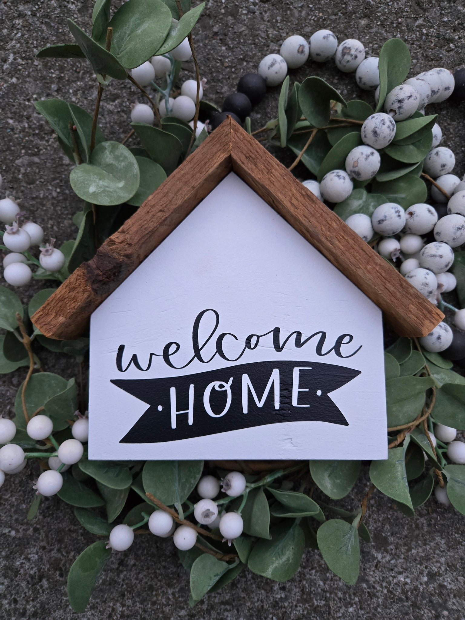Large house "Welcome Home banner" sign